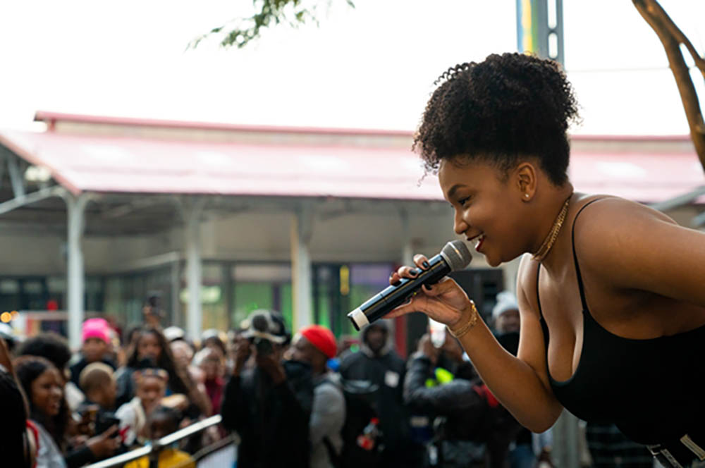 Simmy interacts with the crowd at Newtown Junction during the 2023 edition of Fête de la Musique